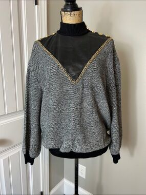 St. John -Black and gray Top with Gold accent and leather.